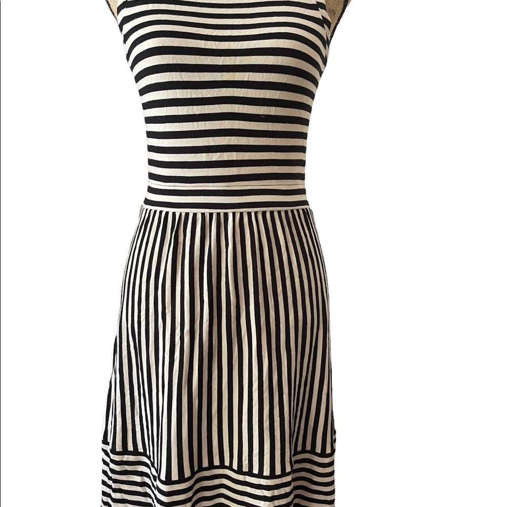 Black and white striped dress with prominent zipper in back